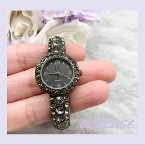 Gunmetal Bangle Quartz Watch with Green Rhinestones